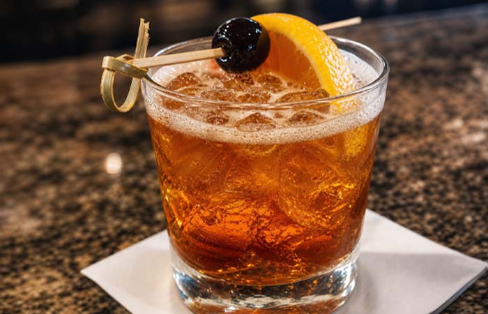 Savor cocktails at Torey’s Restaurant & Bar in Owatonna, garnished with orange and cherry.